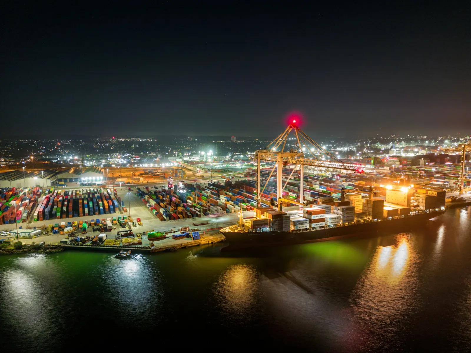 Container port lit up at night